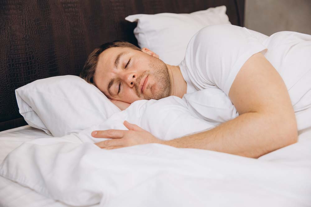 Man sleeping comfortably, representing sleep apnea treatment in Jackson, WY