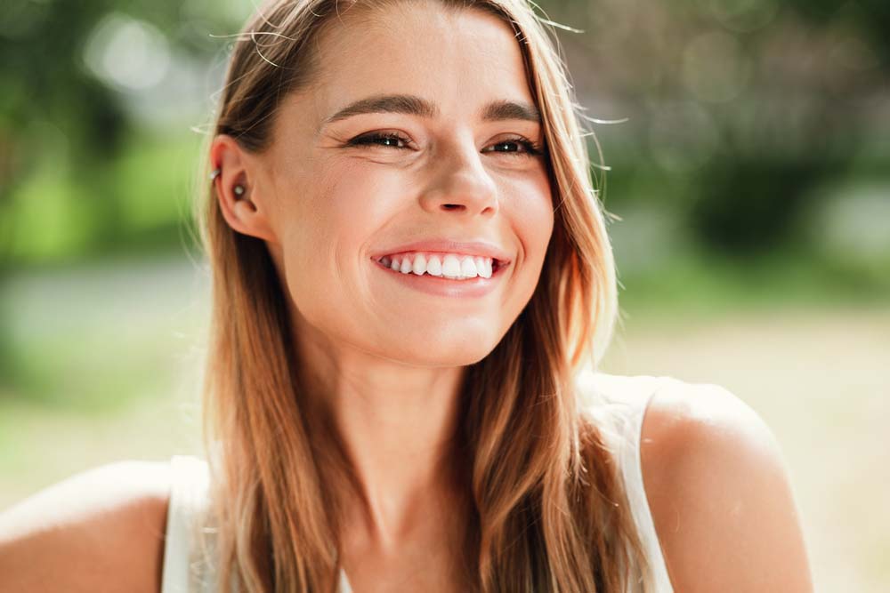 Close-up of woman with bright, healthy smile after Tooth Whitening in Jackson Hole, WY